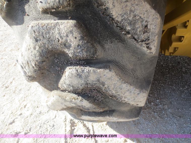 image for item D2208 John Deere 5010 elevating scraper