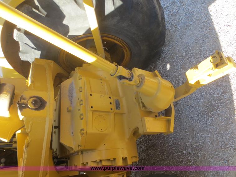 image for item D2208 John Deere 5010 elevating scraper