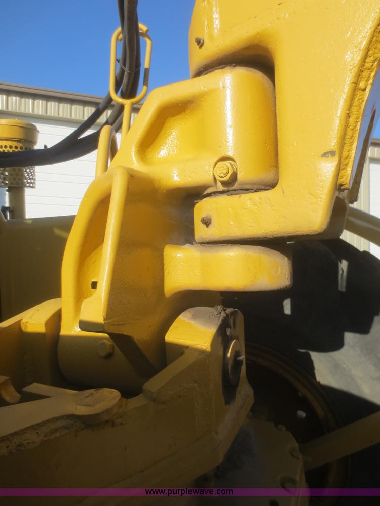 image for item D2208 John Deere 5010 elevating scraper