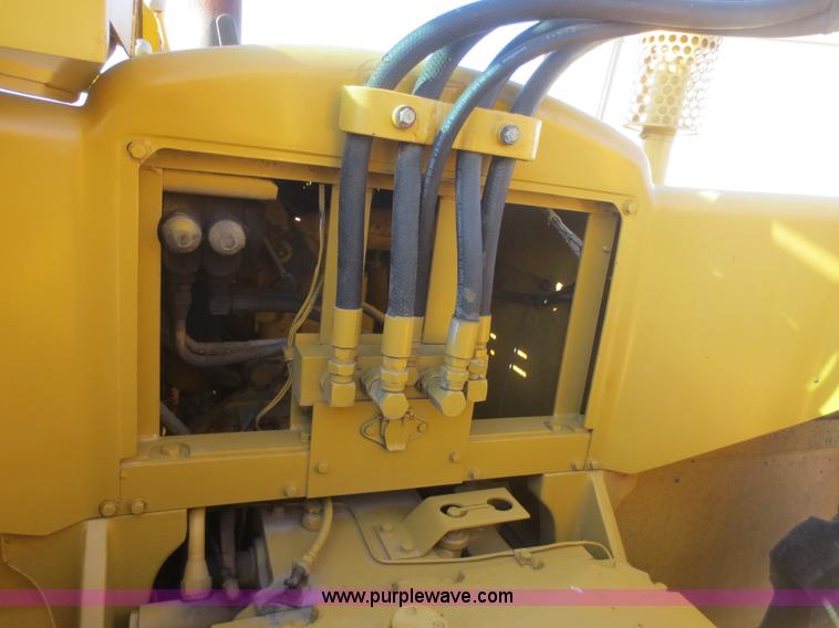 image for item D2208 John Deere 5010 elevating scraper