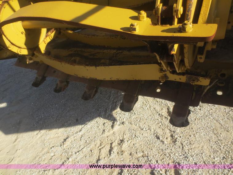 image for item D2208 John Deere 5010 elevating scraper