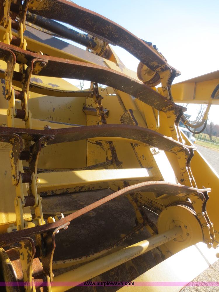 image for item D2208 John Deere 5010 elevating scraper