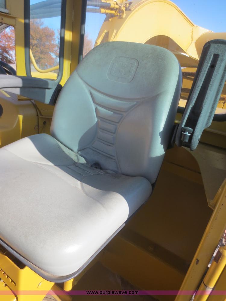 image for item D2208 John Deere 5010 elevating scraper