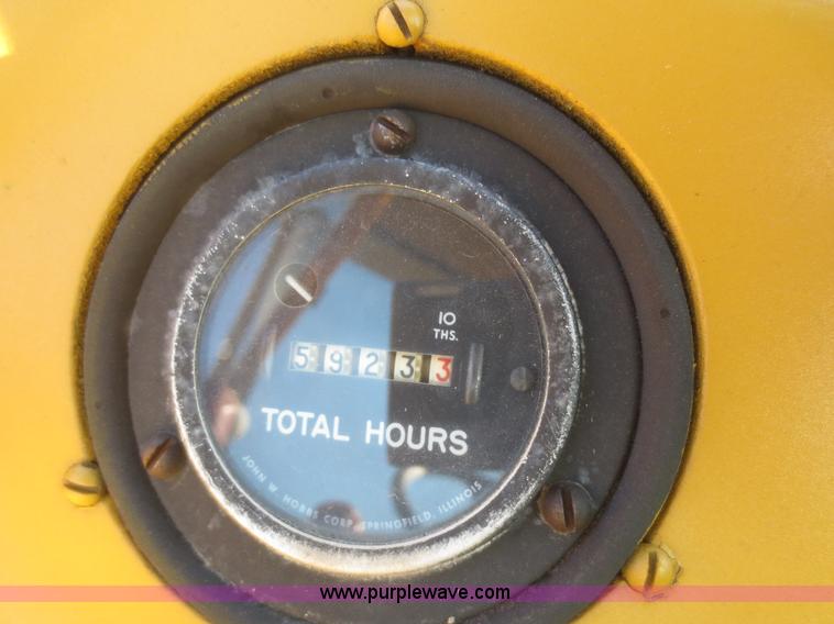 image for item D2208 John Deere 5010 elevating scraper