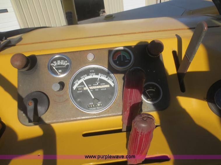 image for item D2208 John Deere 5010 elevating scraper