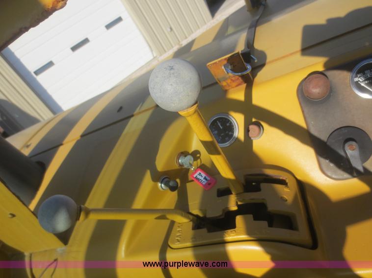 image for item D2208 John Deere 5010 elevating scraper