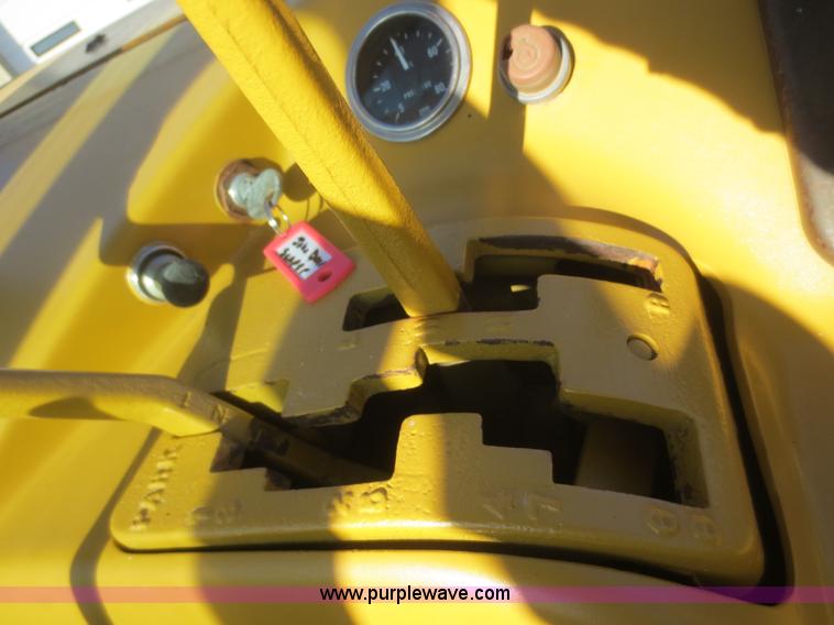 image for item D2208 John Deere 5010 elevating scraper