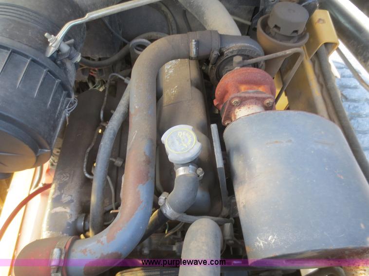 image for item D2212 1998 New Holland LX885 skid steer