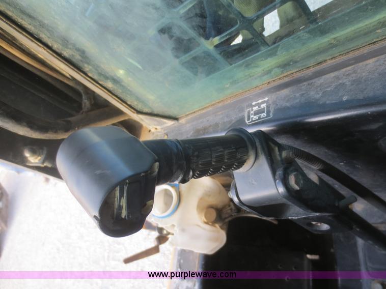 image for item D2212 1998 New Holland LX885 skid steer