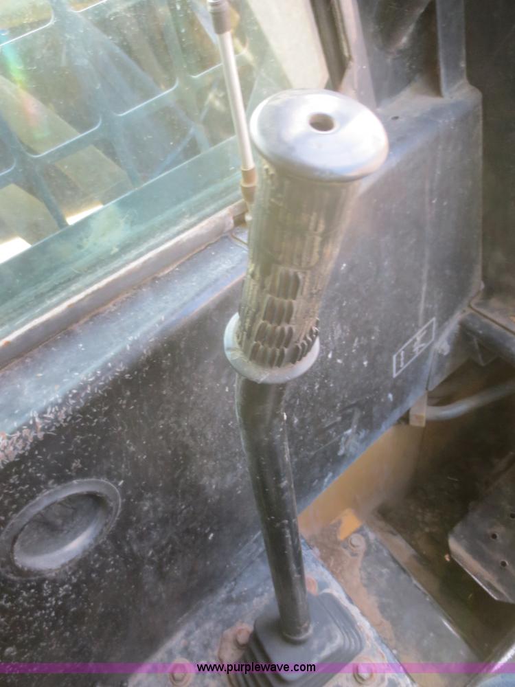 image for item D2212 1998 New Holland LX885 skid steer