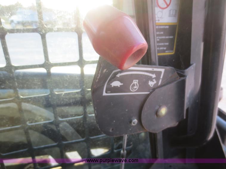 image for item D2212 1998 New Holland LX885 skid steer