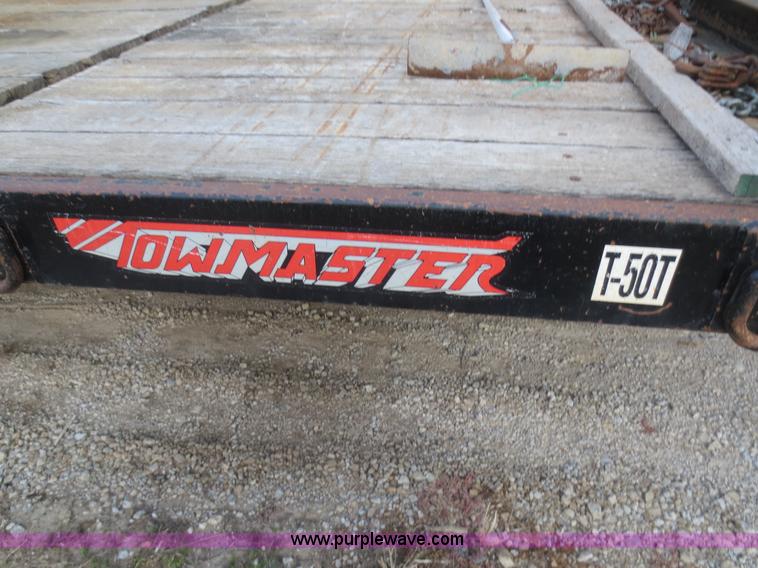 image for item D2213 2005 Towmaster T50T tilt bed equipment trailer