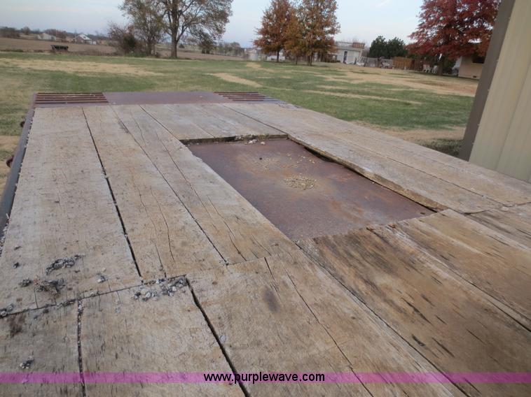 image for item D2213 2005 Towmaster T50T tilt bed equipment trailer