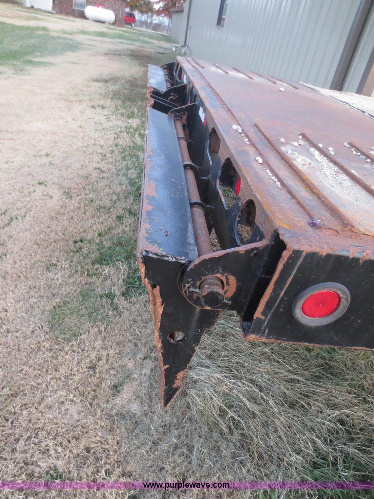 image for item D2213 2005 Towmaster T50T tilt bed equipment trailer