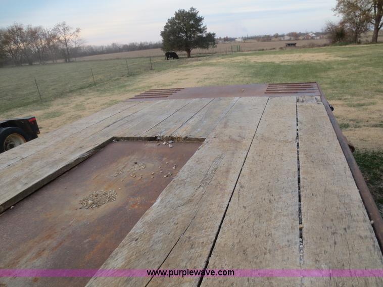 image for item D2213 2005 Towmaster T50T tilt bed equipment trailer