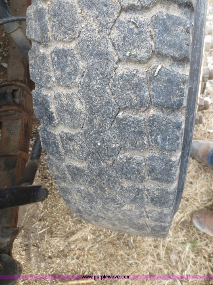 image for item D2236 1986 International S1700 flatbed dump truck