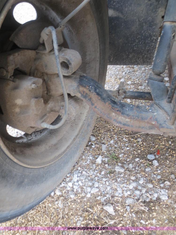 image for item D2236 1986 International S1700 flatbed dump truck