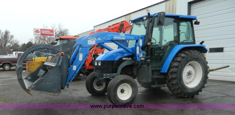 image for item H2306 2002 New Holland TL100 tractor
