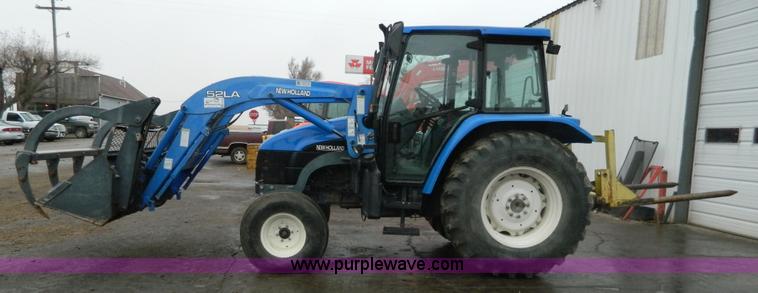 image for item H2306 2002 New Holland TL100 tractor