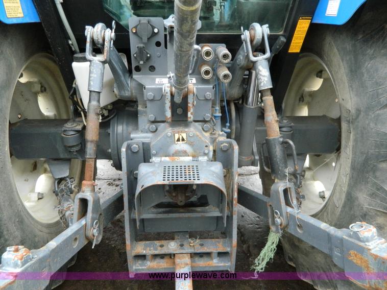 image for item H2306 2002 New Holland TL100 tractor