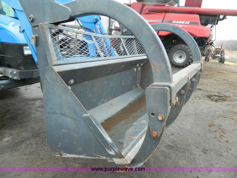 image for item H2306 2002 New Holland TL100 tractor