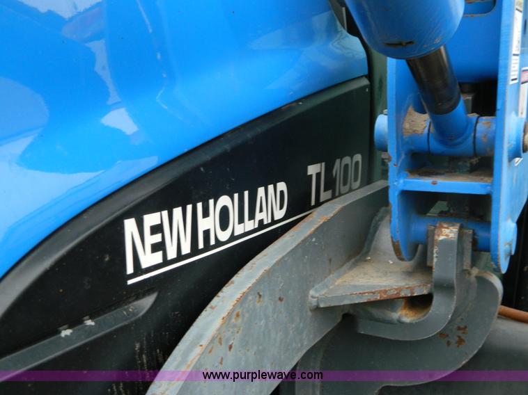 image for item H2306 2002 New Holland TL100 tractor