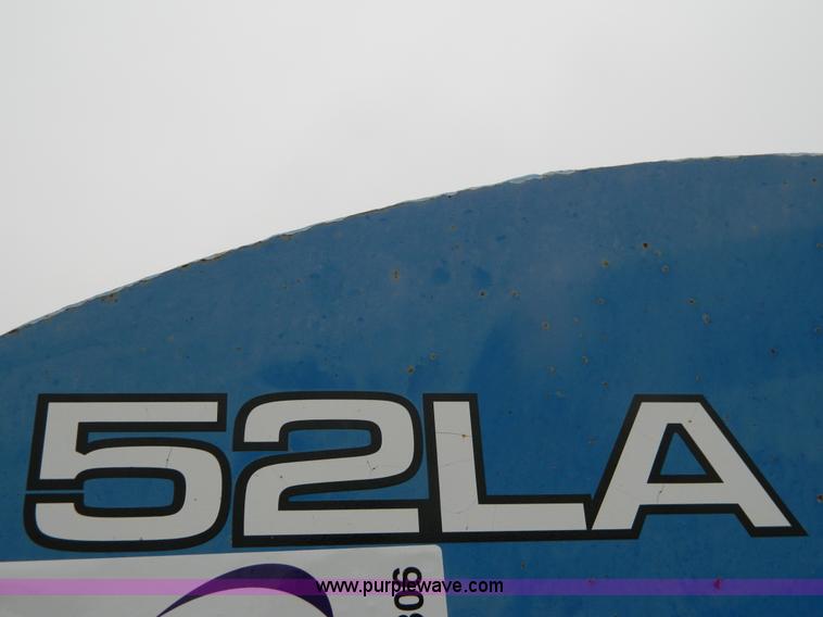 image for item H2306 2002 New Holland TL100 tractor