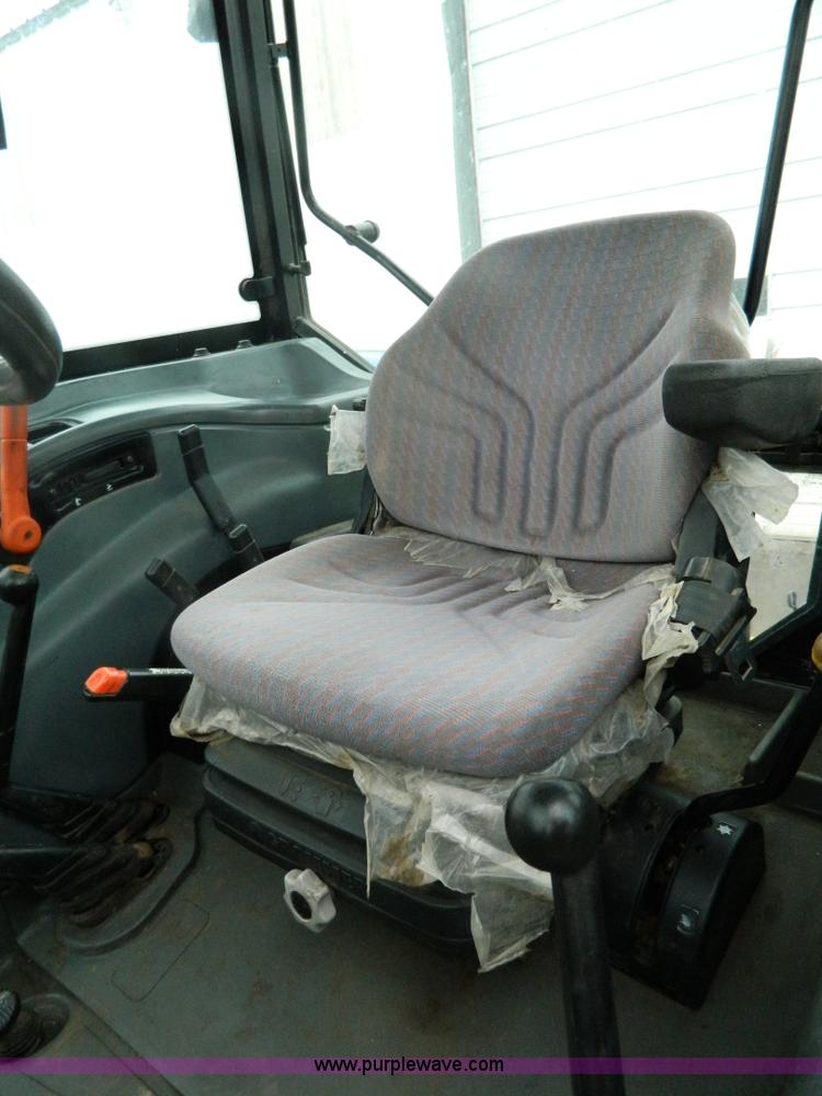 image for item H2306 2002 New Holland TL100 tractor