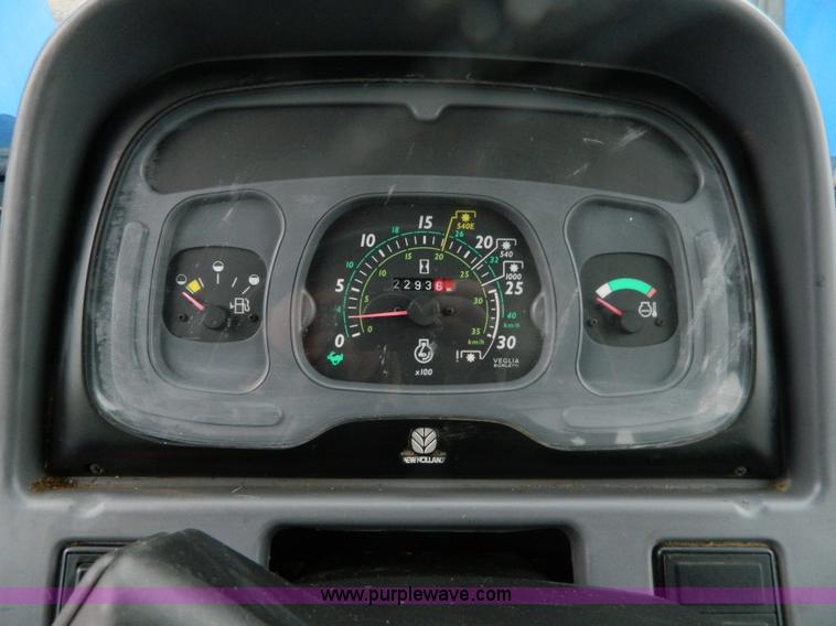 image for item H2306 2002 New Holland TL100 tractor