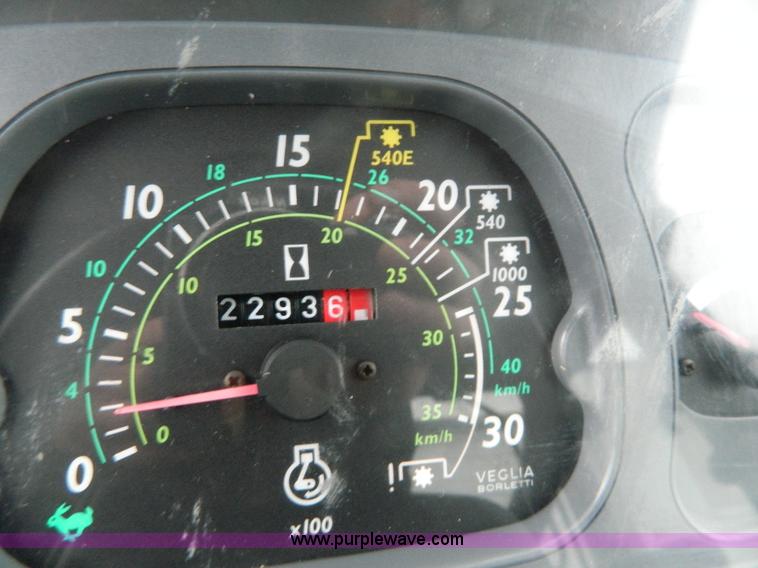 image for item H2306 2002 New Holland TL100 tractor