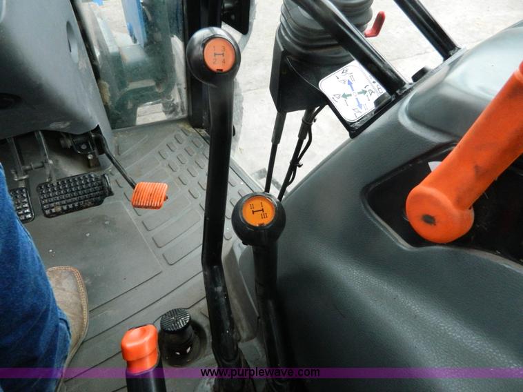 image for item H2306 2002 New Holland TL100 tractor