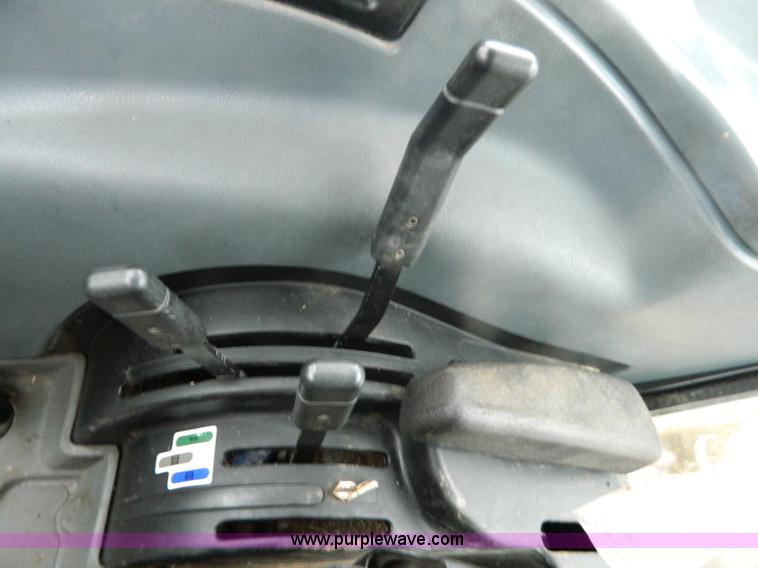 image for item H2306 2002 New Holland TL100 tractor