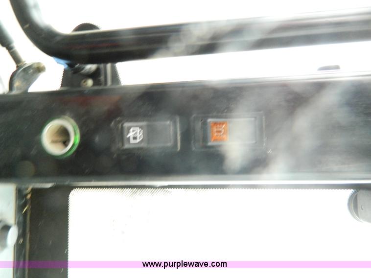 image for item H2306 2002 New Holland TL100 tractor