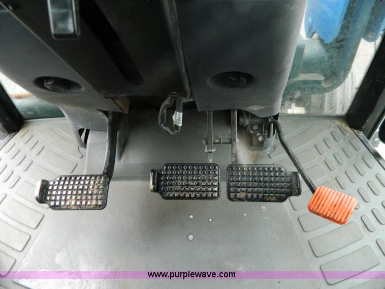 image for item H2306 2002 New Holland TL100 tractor