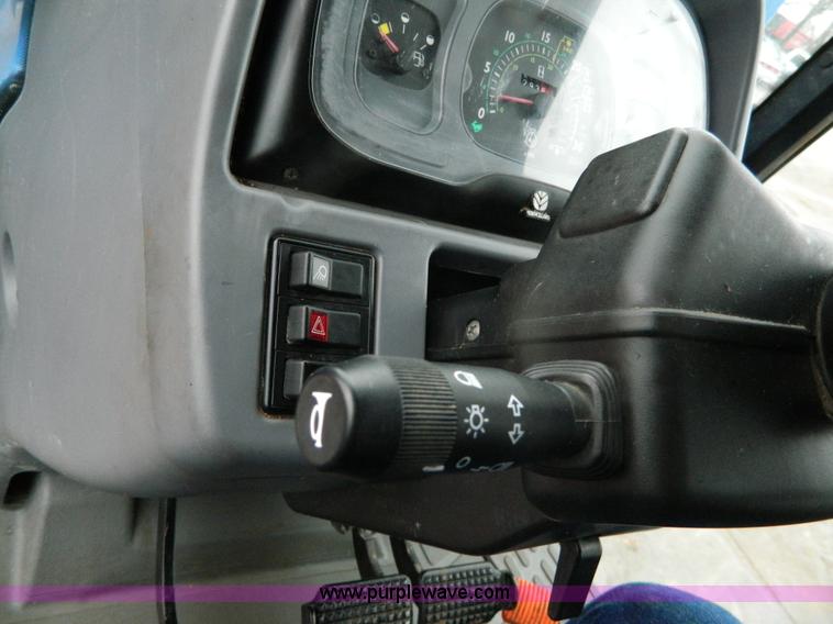 image for item H2306 2002 New Holland TL100 tractor