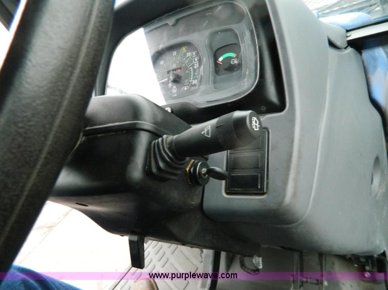 image for item H2306 2002 New Holland TL100 tractor