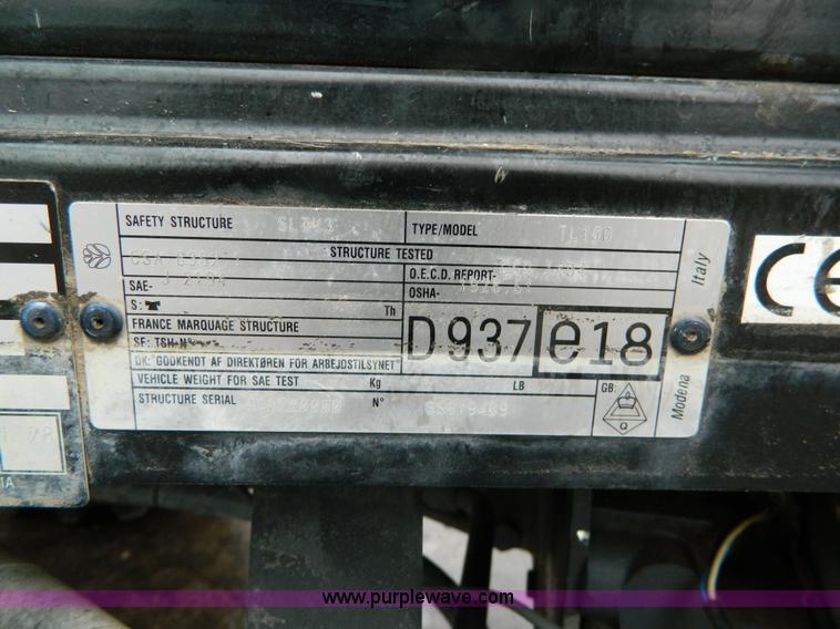 image for item H2306 2002 New Holland TL100 tractor