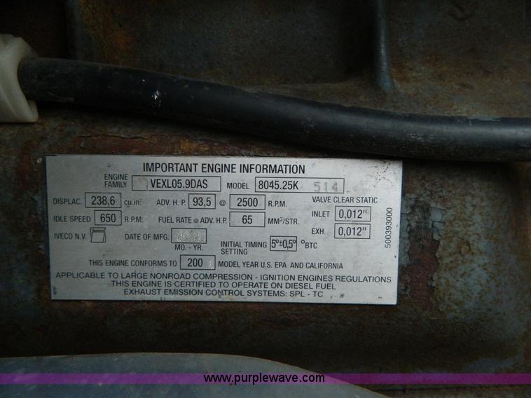 image for item H2306 2002 New Holland TL100 tractor