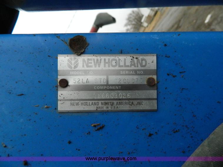 image for item H2306 2002 New Holland TL100 tractor