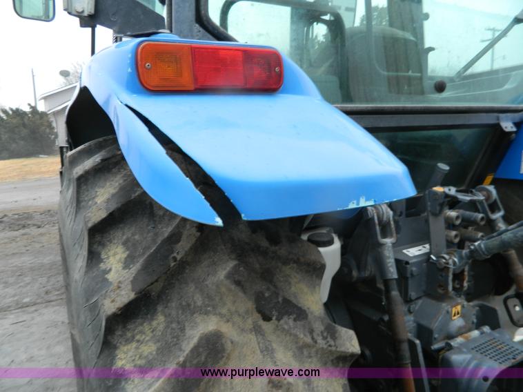 image for item H2306 2002 New Holland TL100 tractor