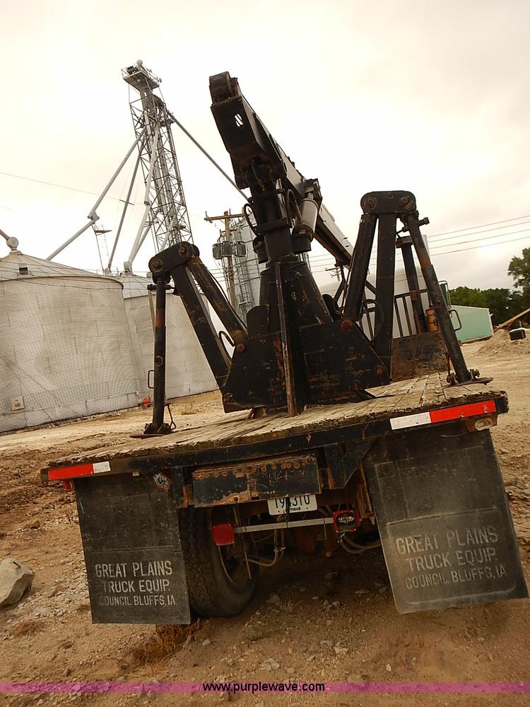 image for item J3092 1975 Chevrolet flatbed truck with crane