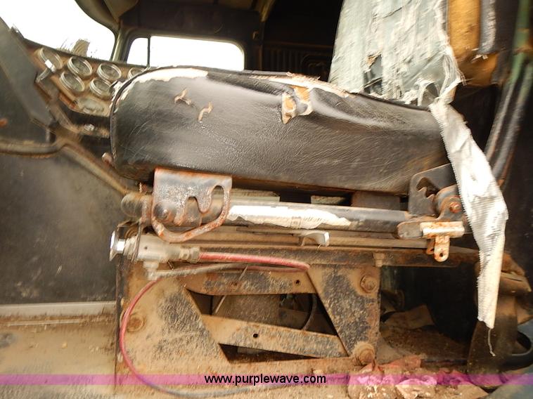 image for item J3092 1975 Chevrolet flatbed truck with crane