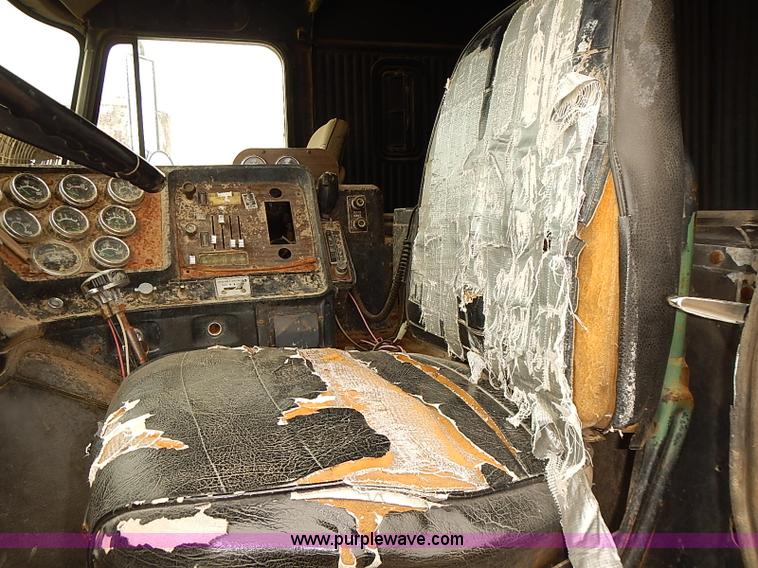 image for item J3092 1975 Chevrolet flatbed truck with crane