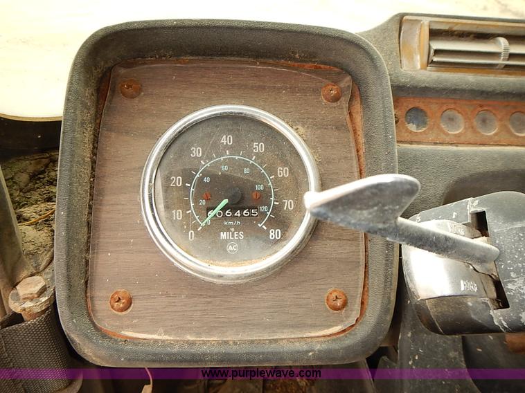 image for item J3092 1975 Chevrolet flatbed truck with crane