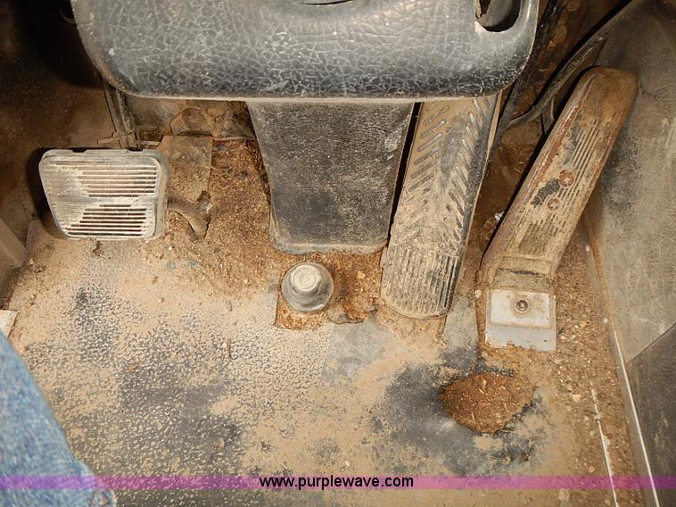 image for item J3092 1975 Chevrolet flatbed truck with crane