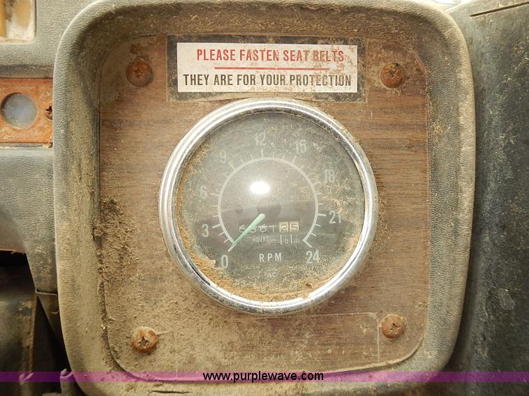 image for item J3092 1975 Chevrolet flatbed truck with crane