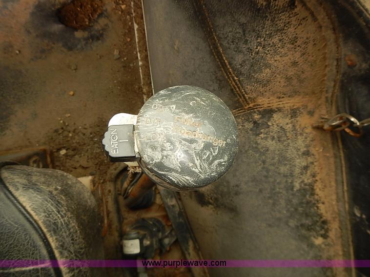 image for item J3092 1975 Chevrolet flatbed truck with crane