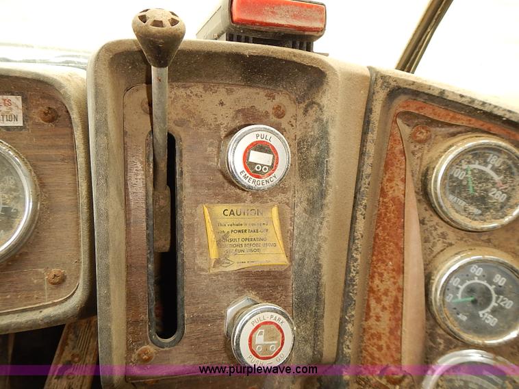 image for item J3092 1975 Chevrolet flatbed truck with crane