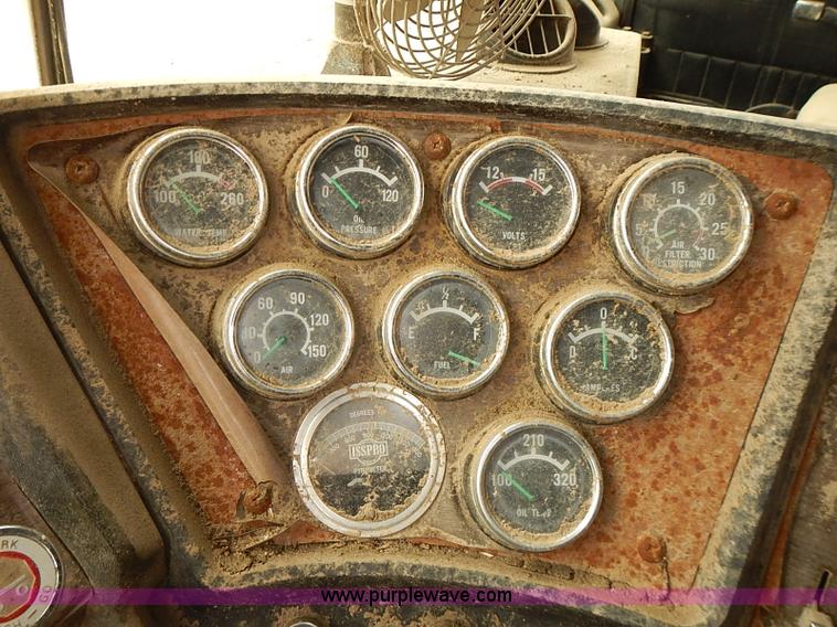 image for item J3092 1975 Chevrolet flatbed truck with crane