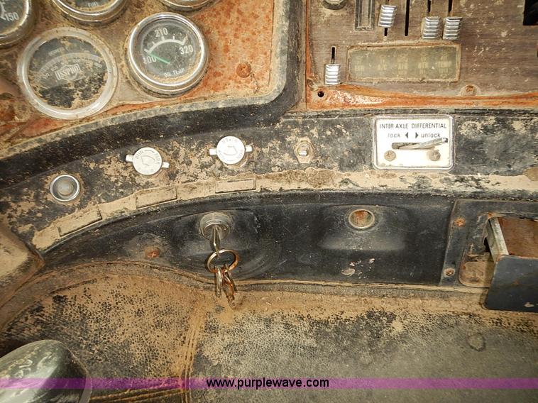 image for item J3092 1975 Chevrolet flatbed truck with crane